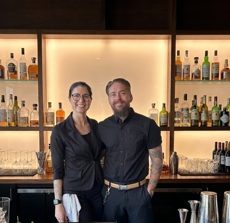 Lana and Seth at their bar setup